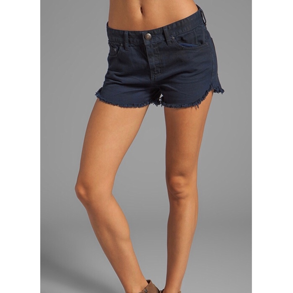 Free People • Dark Blue Dolphin Hem Shorts